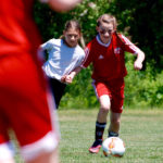 Young Girls Playing Soccer